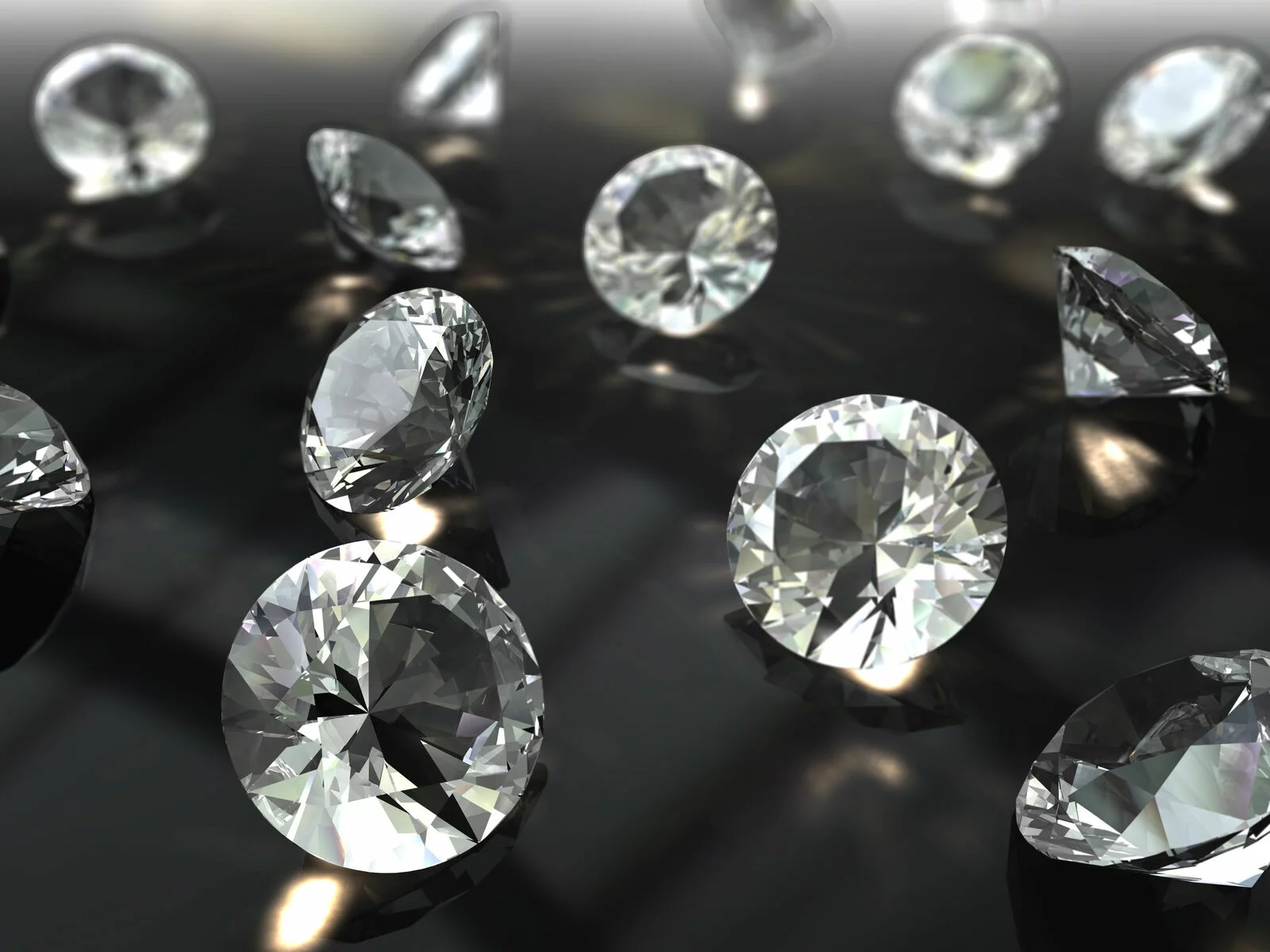 Mehrere kleine Diamanten auf einem dunklen Untergrund